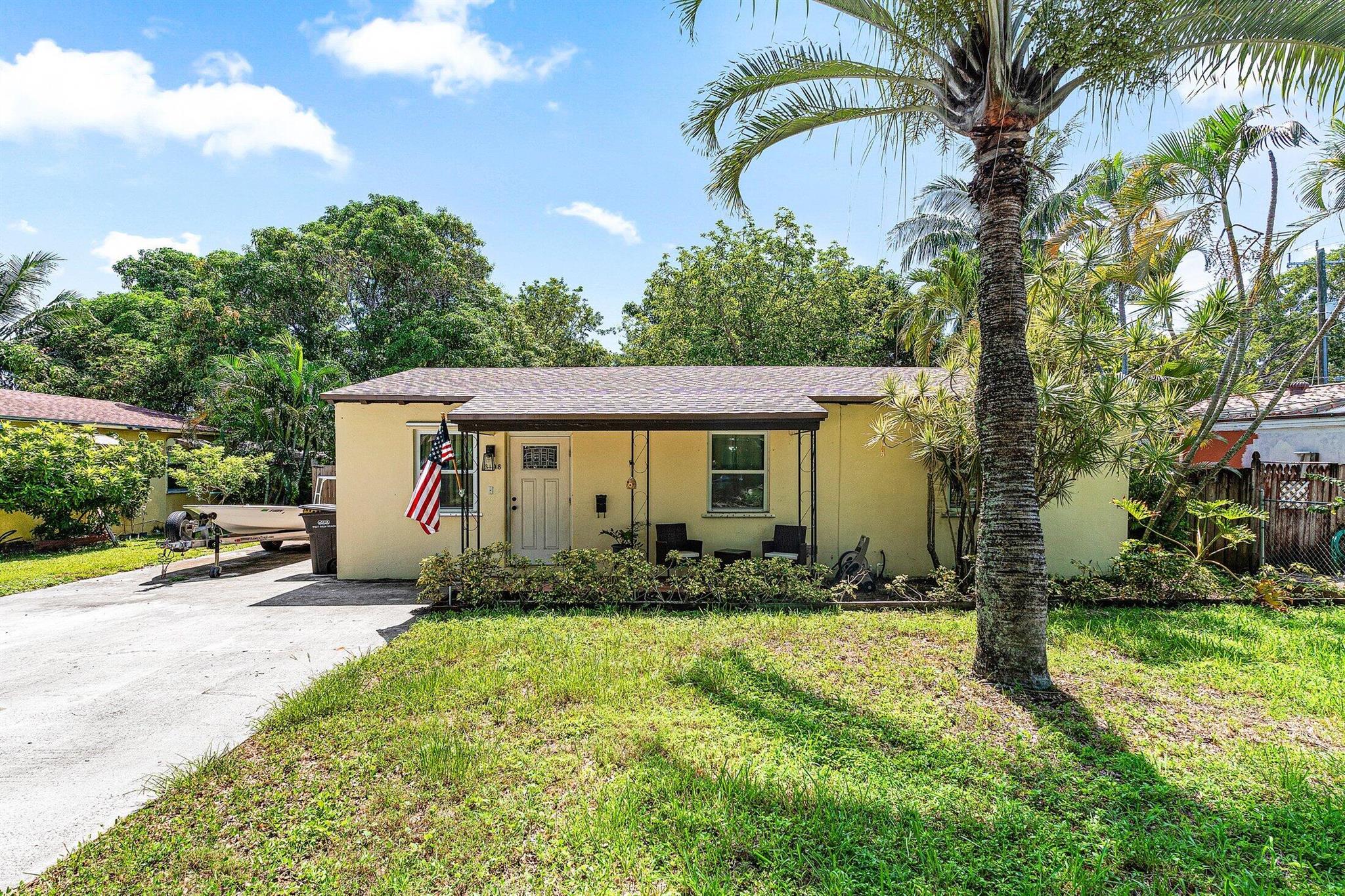 Amazing Location at a Great Price! Look at this charming 3-bedroom, 1-bath CBS home located on a quiet street in a highly desirable neighborhood. Set on a generous 6847 sq. ft. lot, this property offers plenty of potential -- including room for expansion and a pool. Fully fenced in yard includes a storage shed, large driveway for ample parking and wide gate access to the backyard perfect for a boat. The interior boasts a beautifully remodeled kitchen with granite countertops, stainless steel appliances, fresh white cabinetry, and a tile backsplash. Newer vinyl flooring throughout. Additional features include: Roof less than 1 year old, Newer washer dryer, Laundry room with extra storage. Located east of I-95, directly across from a large park and within walking distance to schools,