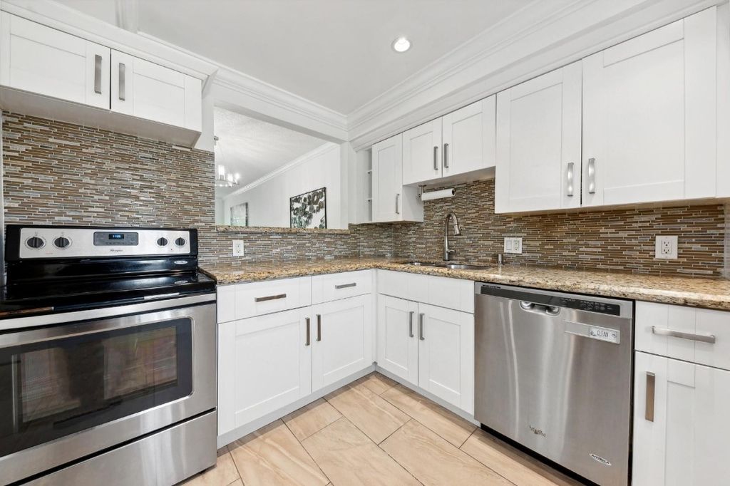 Photo of 3000 S Course Drive #306, Pompano Beach, FL 33069 (MLS # F10462871)