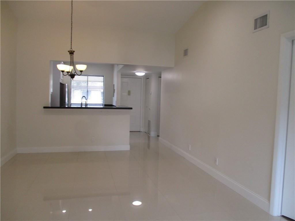Photo of 6550 Somerset Drive #207, Boca Raton, FL 33433 (MLS # F10506115)