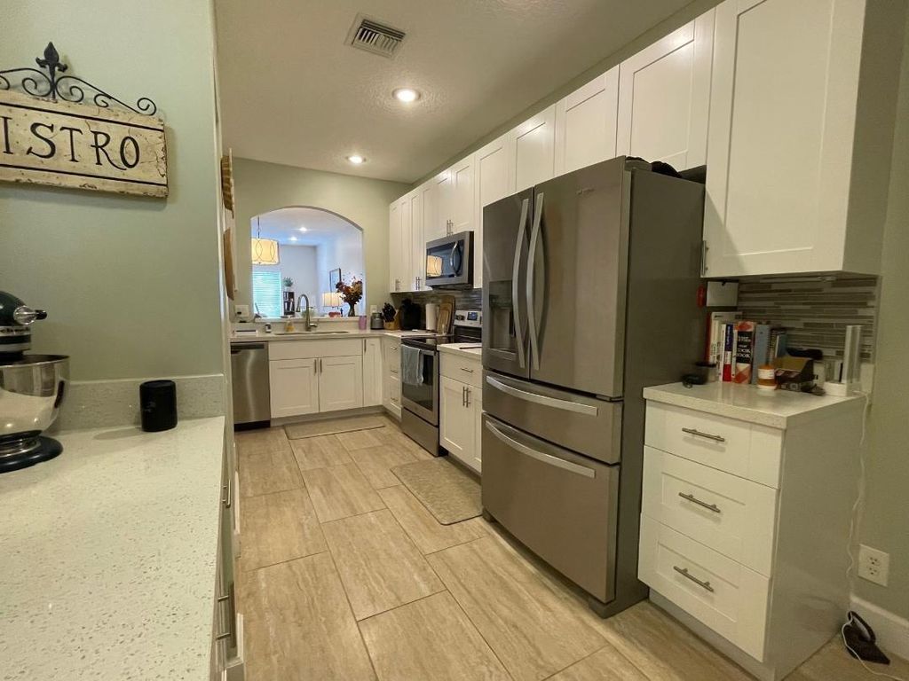 Photo of 1058 SW 42nd Ter #1058, Deerfield Beach, FL 33442 (MLS # F10543056)