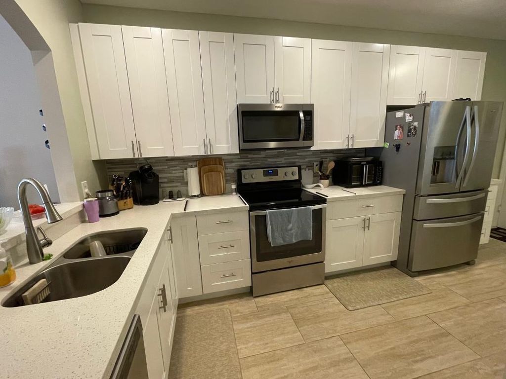 Photo of 1058 SW 42nd Ter #1058, Deerfield Beach, FL 33442 (MLS # F10543056)