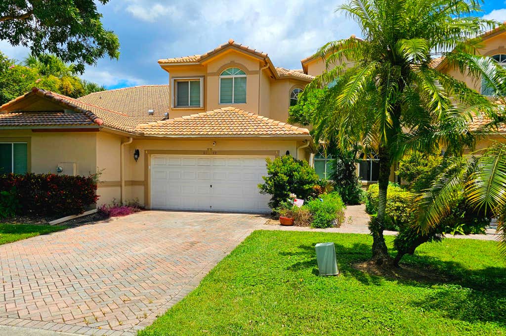 Photo of 8149 MADISON LAKES Circle S, Davie, FL 33328 (MLS # B26064473)