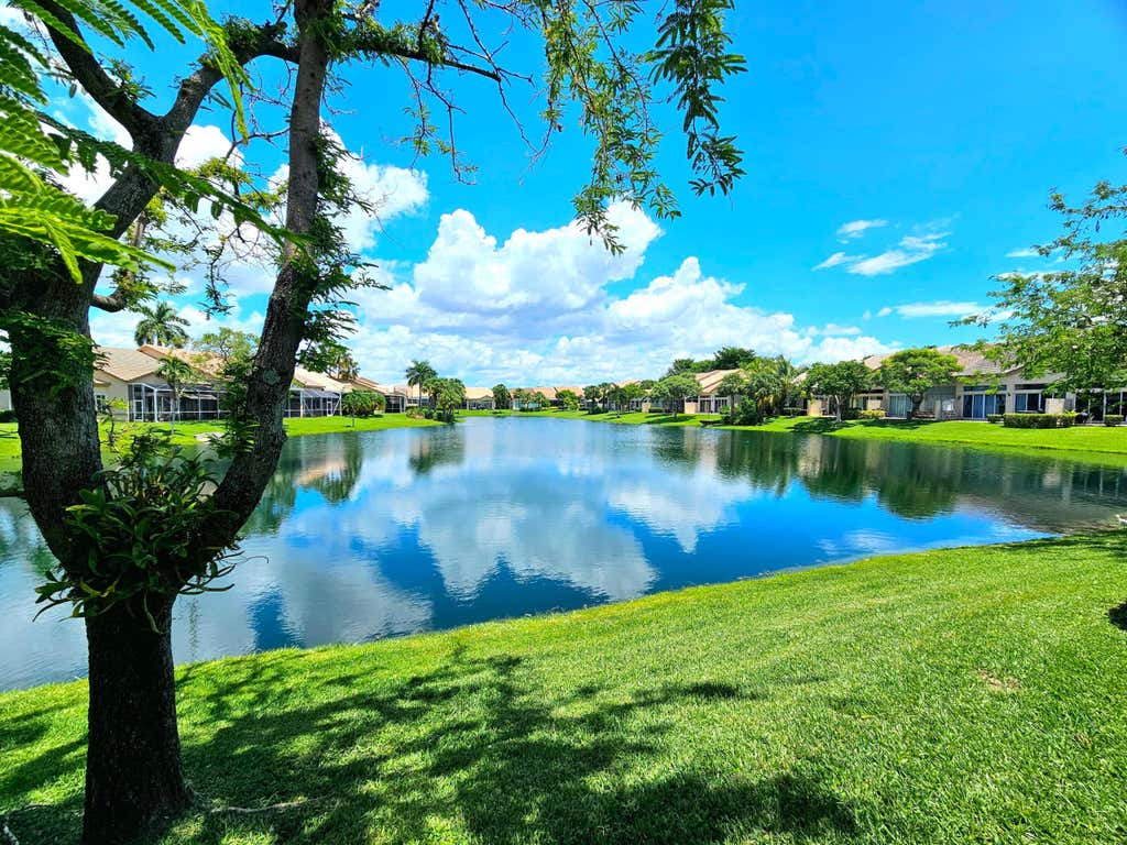 Photo of 8149 MADISON LAKES Circle S, Davie, FL 33328 (MLS # B26064473)