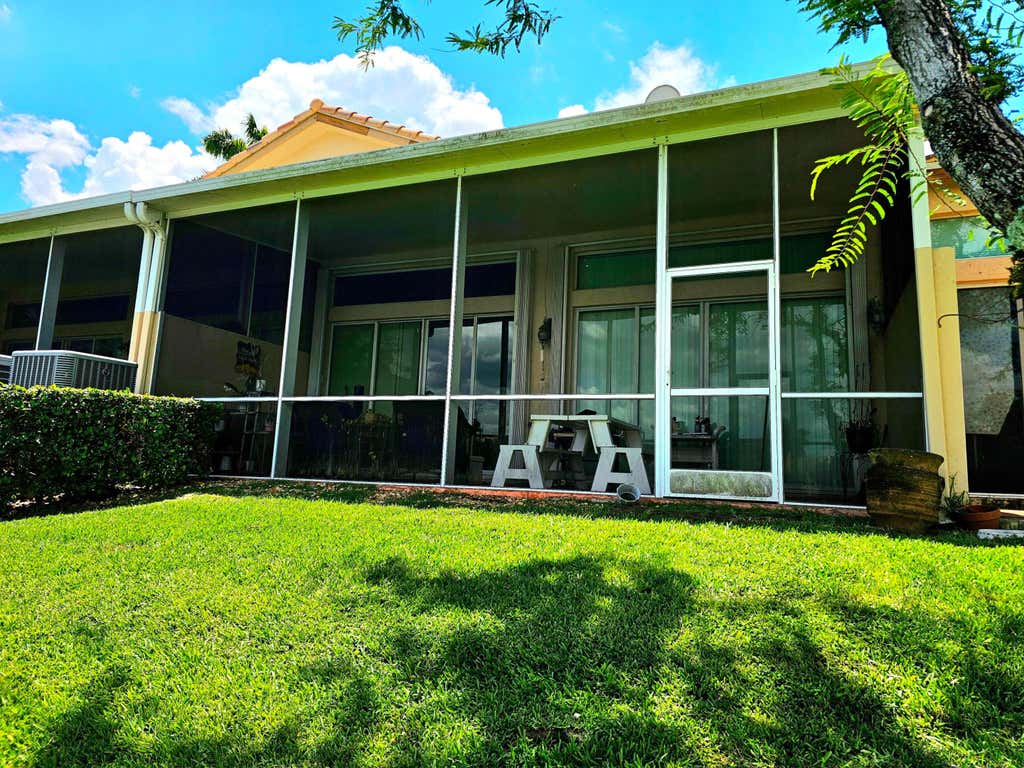 Photo of 8149 MADISON LAKES Circle S, Davie, FL 33328 (MLS # B26064473)