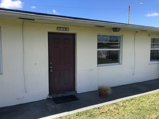 2/1 in west palm beach closed to shopping. Has been freshly painted and new kitchen cabinets installed, washer and dryer full size. small back yard space.1st last and security moves you in. NO HOA. owner will consider small cat or dog. (20 lbs or smaller). Ready for move in, quick approval process.