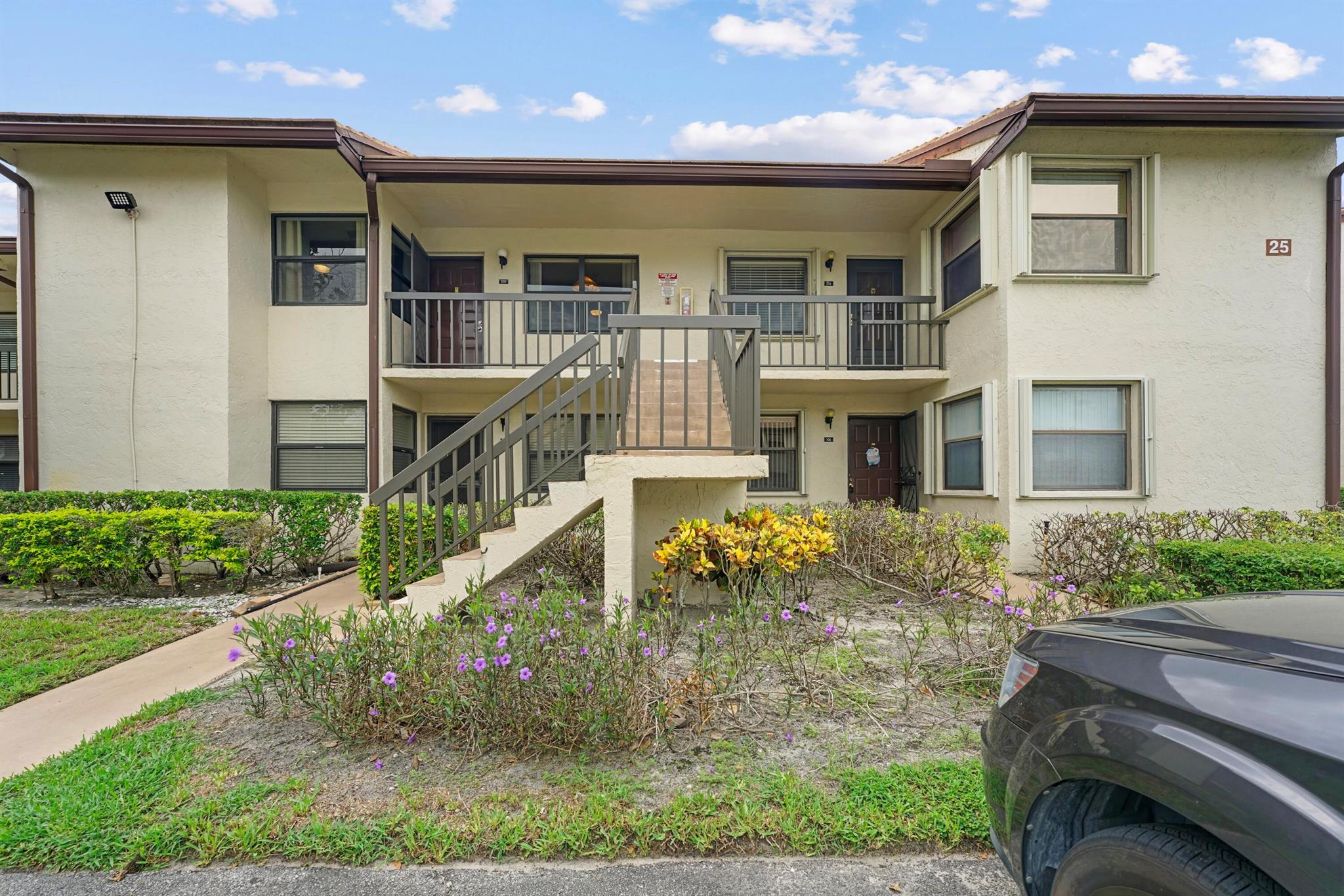 Well-maintained 2-bedroom, 2-bath condo in 55+ Lucerne Pointe. Features include impact windows, 2019 A/C, 2021 water heater, newer carpet, and vaulted ceilings. Popcorn ceilings have been removed, and the living room has been opened to enhance the natural light and overall space. The primary suite offers a large walk-in closet. Clean and move-in ready, this unit provides comfortable living in a desirable community close to shopping, dining, and major roadways.