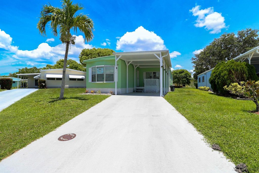 Photo of 14 Don Quixote Lane, Port Saint Lucie, FL 34952 (MLS # R11036373)