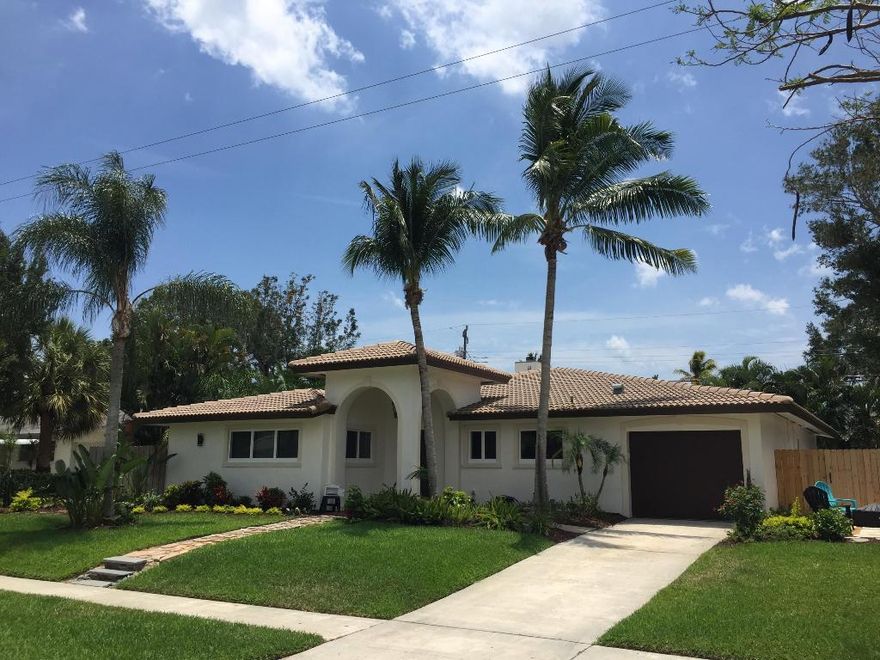 Do not miss this spectacular home in Addison school district. Great curb appeal, lush landscape, front yard sitting area, fantastic street, new hurricane impact doors and windows, open kitchen, new stainless appliances & double oven, newer washer/dryer, vaulted ceilings, LED high hat lighting, wood burning/double sided fireplace, fresh paint inside and out, neutral colors, 4 inch baseboards, 2 master bedrooms with walk-in closets, split floorplan, alarm system, ring.com camera doorbell, new light fixtures, huge backyard deck that's great for entertaining & grilling.  Candle sconces excluded. Wall unit in family room negotiable or for sale. Great Home!! Move right in!