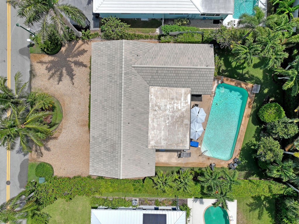 Photo of 306 CASCADE Lane, Palm Beach Shores, FL 33404 (MLS # B26072413)