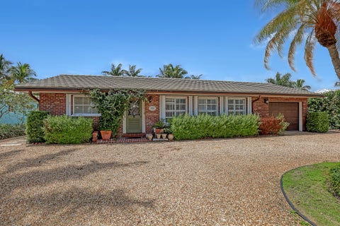 Photo of 306 CASCADE Lane, Palm Beach Shores, FL 33404 (MLS # B26072413)