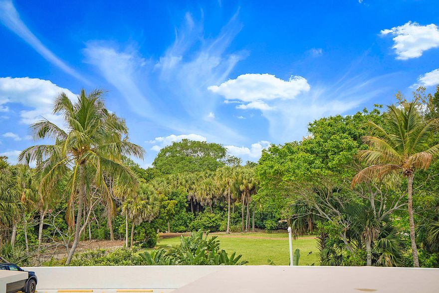 Incredible natural light in this NW Corner unit, lovely views of the lush trees of the Ocean Strand Park. Updated opened kitchen with wood cabinets and granite counter tops, tile floors throughout the unit, with some upgrades to the bathrooms, primary bedroom with walk in closet.   The flexible floor plan includes guest bedrooms that can easily serve as a den or private office. Enjoy the convenience of an additional storage room on the same floor. From your private balcony, soak in spectacular sunsets over the water. Just steps away, an exclusive gated beach access with outdoor shower awaits, leading you to the sparkling Atlantic Ocean.  Resort-Style Amenities Include: " Elegant lobby & 24-hour front desk attendant " Two f Resort-Style Amenities Include: " Elegant lobby & 24-hour front desk attendant " Two fitness centers + his & hers saunas " Community kitchen & sophisticated lounge for entertaining " Library, game rooms, pool table, and ping pong " Bike, kayak, and surfboard storage " Heated waterfront pool with al fresco picnic area overlooking the Intracoastal " Chef's double grilling station with ambient evening lighting " Boat slips available for lease & guest dockage Located near fine dining, luxury shopping, golf courses, and airports. Building Updates: Concrete restoration and exterior paint was just completed to meet 40-year certification, which will enhance property values