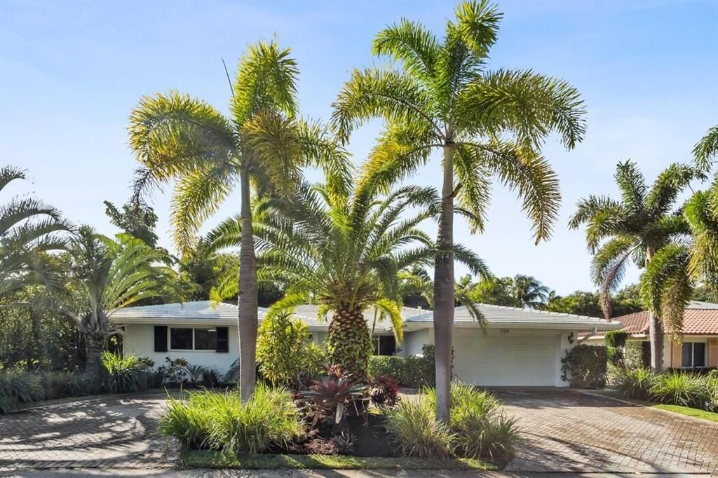 Photo of 224 Tacoma Lane, Palm Beach Shores, FL 33404 (MLS # R10862233)