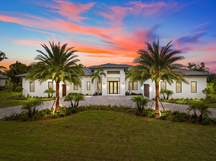 Welcome to Bay Hill Estates! Gorgeous new construction on 1-acre lot backing up preserve. A total of 5 bedroom, 4.5 baths, 4 car garage with just 7,000 SF under roof. Contemporary style with open floor plan; 19-foot foyer, 14-foot ceilings in main area, 12-foot ceilings throughout (including garages), 14-foot island, a master suite leading to T&G covered lanai, full outdoor kitchen, club room with wet bar, salt water heated pool & spa. Top-of-the-line finishes and fixtures throughout. Thermador appliances including a 24'' wine-column and a 1,000 gallon propane tank. Generator ready, motorized screens, 100'' linear fireplace, 85'' Samsung QLED TV & much more. Pictures from same model, potential to customize some of the finishes. Property under construction with delivery April 2024.