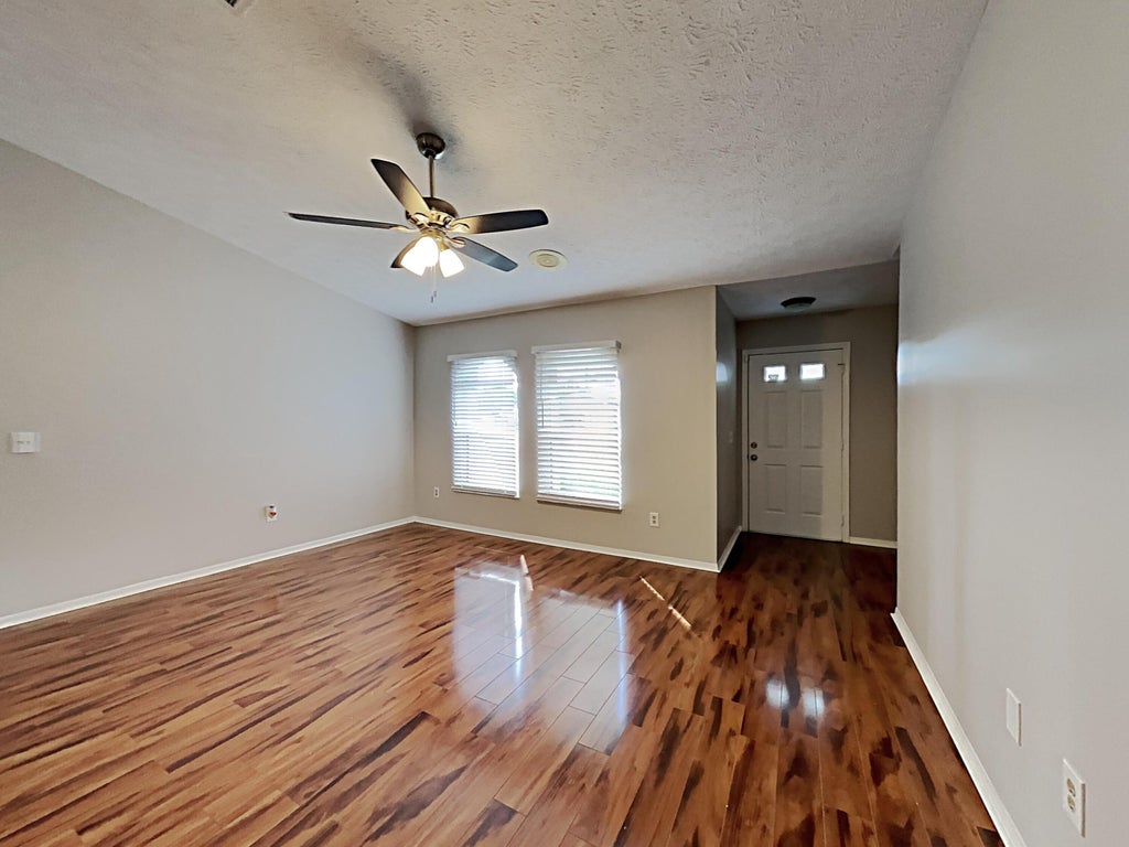 Photo of 4215 SW JARMER Road, Port Saint Lucie, FL 34953 (MLS # B26069287)