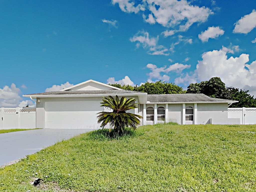 Photo of 4215 SW JARMER Road, Port Saint Lucie, FL 34953 (MLS # B26069287)