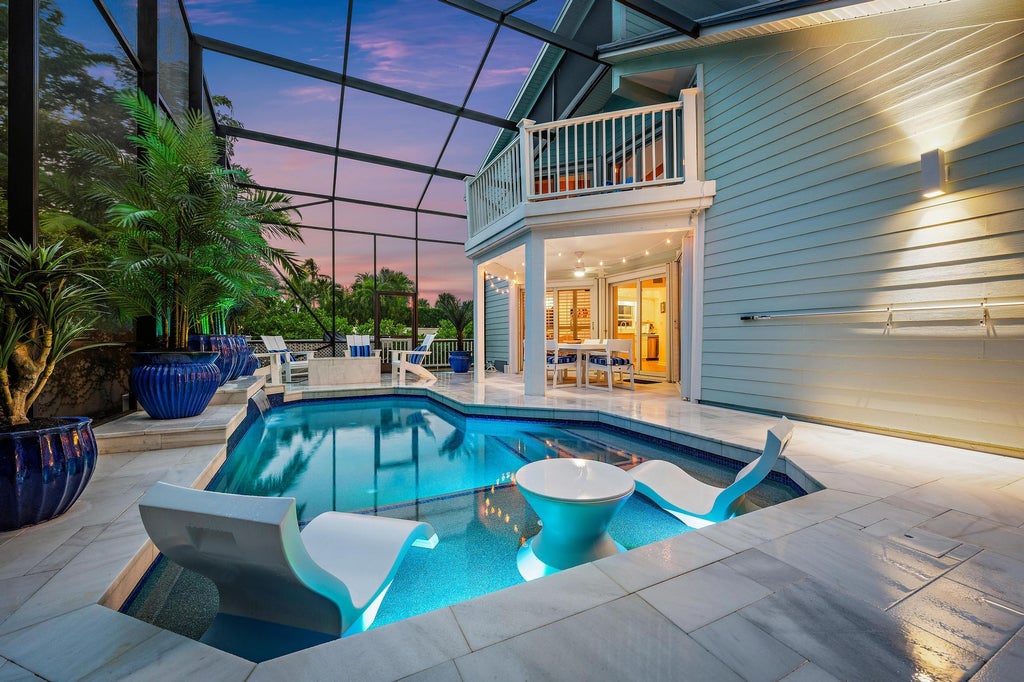 Photo of 604 Xanadu Place, Jupiter, FL 33477 (MLS # B26090370)
