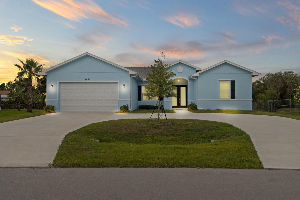Photo of 2865 SW Seaside Road, Port Saint Lucie, FL 34953 (MLS # F10441559)