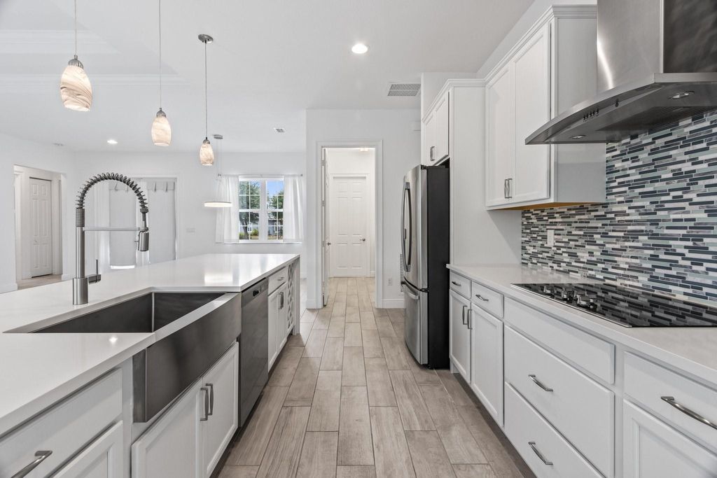 Photo of 2865 SW Seaside Road, Port Saint Lucie, FL 34953 (MLS # F10441559)