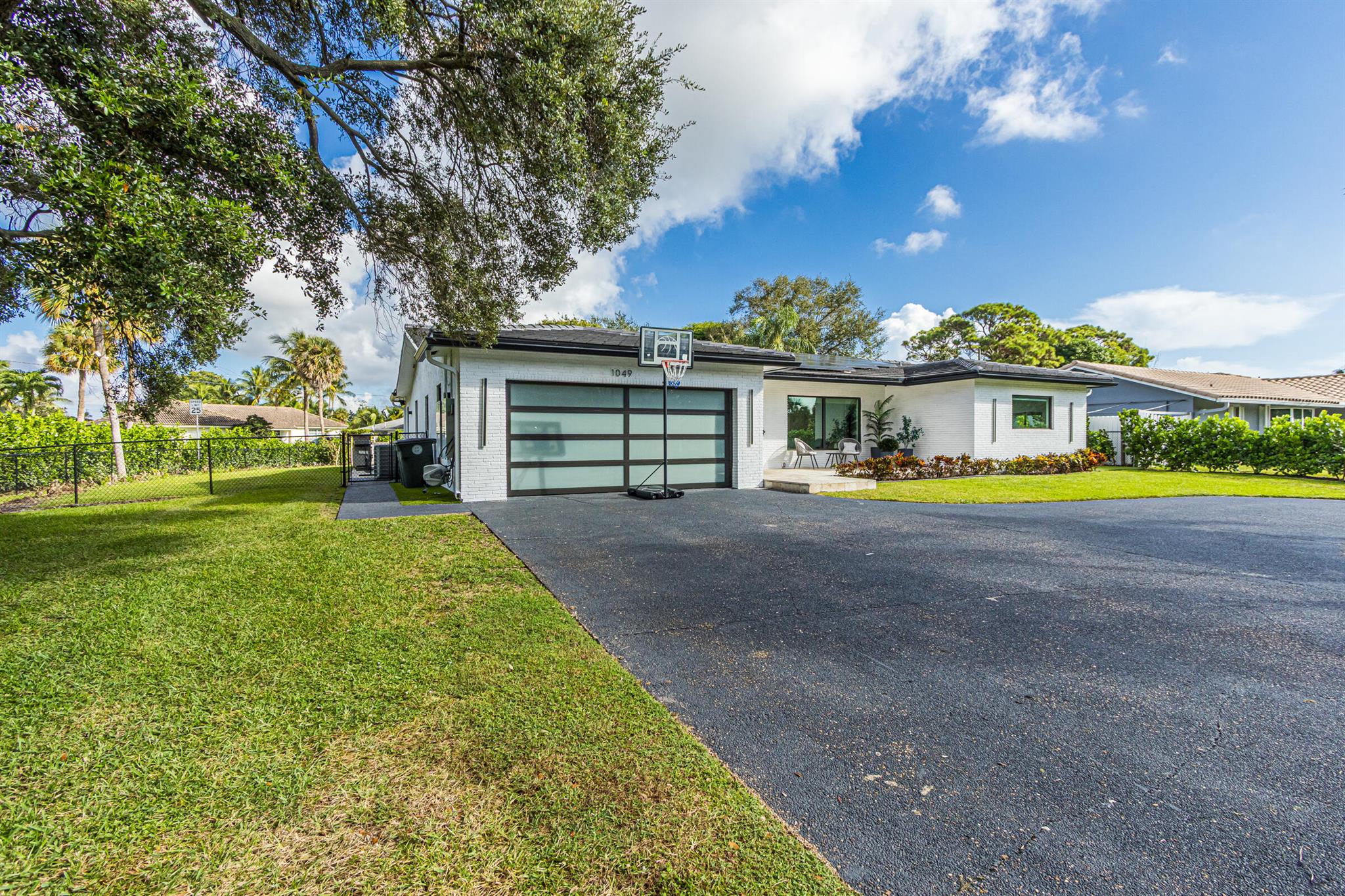 Beautifully renovated 3-bedroom, 2-bath pool home located in the highly sought-after Lake Floresta Park community, within one of the city's top A-rated school districts. This stunning residence features a modern open floor plan with high-end finishes--no expense spared! The garage has been converted into a fully air-conditioned recreation room, perfect for entertaining or additional living space. Step outside to your outdoor kitchen and sparkling pool--enjoy Florida living at its finest!