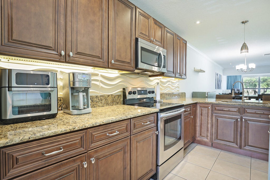 Photo of 1141 Calamondin Terrace #202, Delray Beach, FL 33445 (MLS # B26054620)