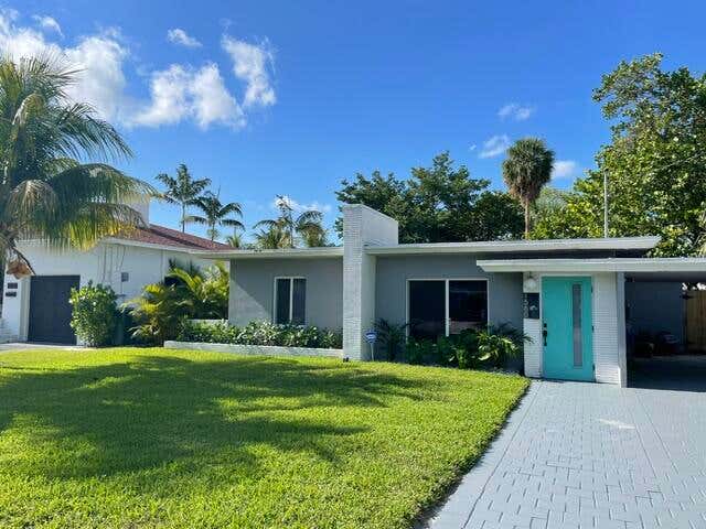 Photo of 1560 NE 32nd Street, Oakland Park, FL 33334 (MLS # B26051534)