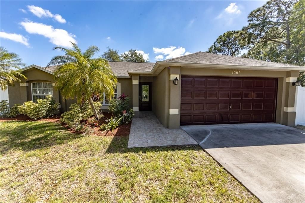 Photo of 1565 SW Hibiscus St, Port Saint Lucie, FL 34983 (MLS # F10276214)
