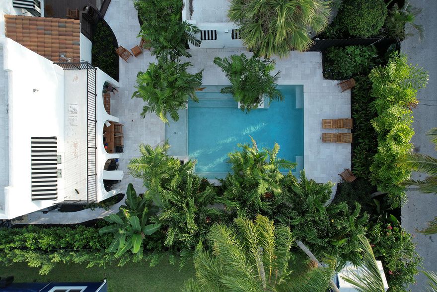 Stunning Spanish-style pool home in coveted Osceola Park, just 7 blocks to Atlantic Ave and a short bike ride to the beach. Set on an oversized ¼-acre lot, this 3BR/3.5BA residence offers 2,500 sq ft of light-filled living. Chef's kitchen with 6-burner gas range, Sonos sound, and a luxe primary suite with private terrace and spa-like bath. Escape to your own tropical oasis with heated pool, water features, and cabana bath. Impact windows/doors. Walk to top dining, shops, and nightlife. Live the ultimate Delray lifestyle with sun-soaked days, vibrant evenings, and effortless indoor-outdoor living. Annual rental.