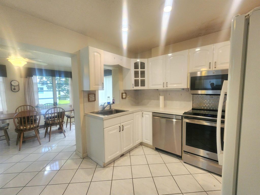 Photo of 108 SW 18th Street, Boynton Beach, FL 33426 (MLS # R11124190)