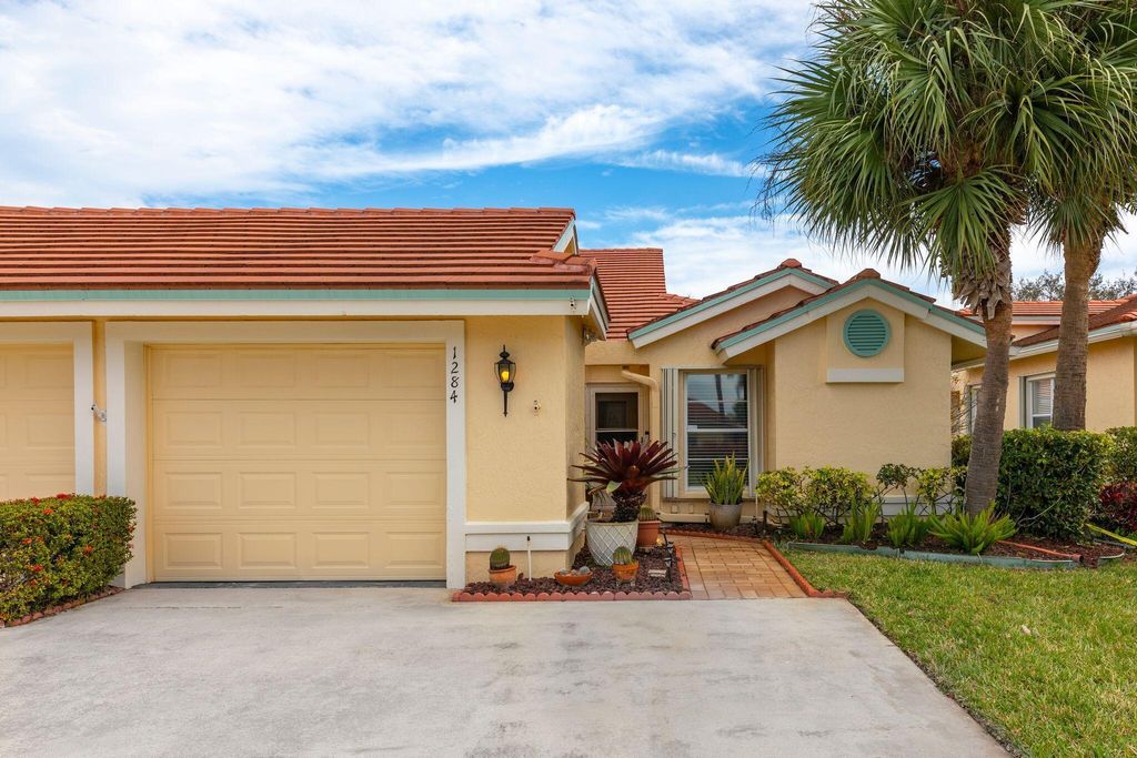Photo of 1284 SW Greens Pointe Way, Palm City, FL 34990 (MLS # R10964401)