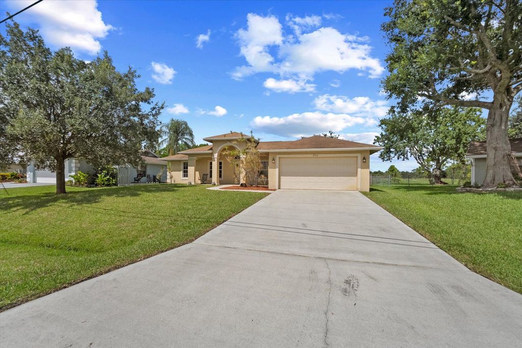 Photo of 3514 SW Zullo Street, Port Saint Lucie, FL 34953 (MLS # R11015056)
