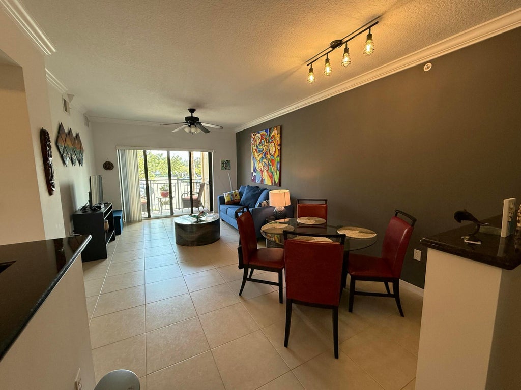Photo of 4903 Midtown Lane #3211, Palm Beach Gardens, FL 33418 (MLS # R11067045)