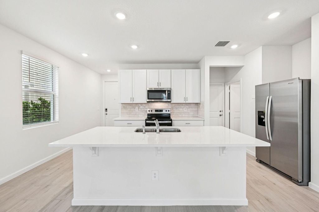 Photo of 608 Salisbury Circle, Fort Pierce, FL 34982 (MLS # B26021042)