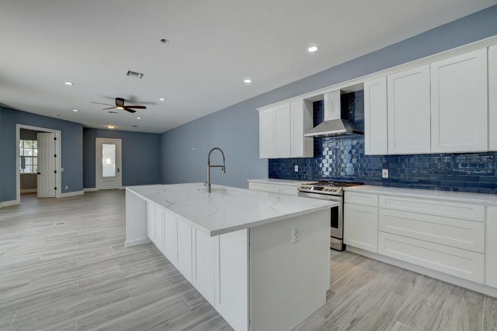 Photo of 165 Honeysuckle Drive, Jupiter, FL 33458 (MLS # R10981947)