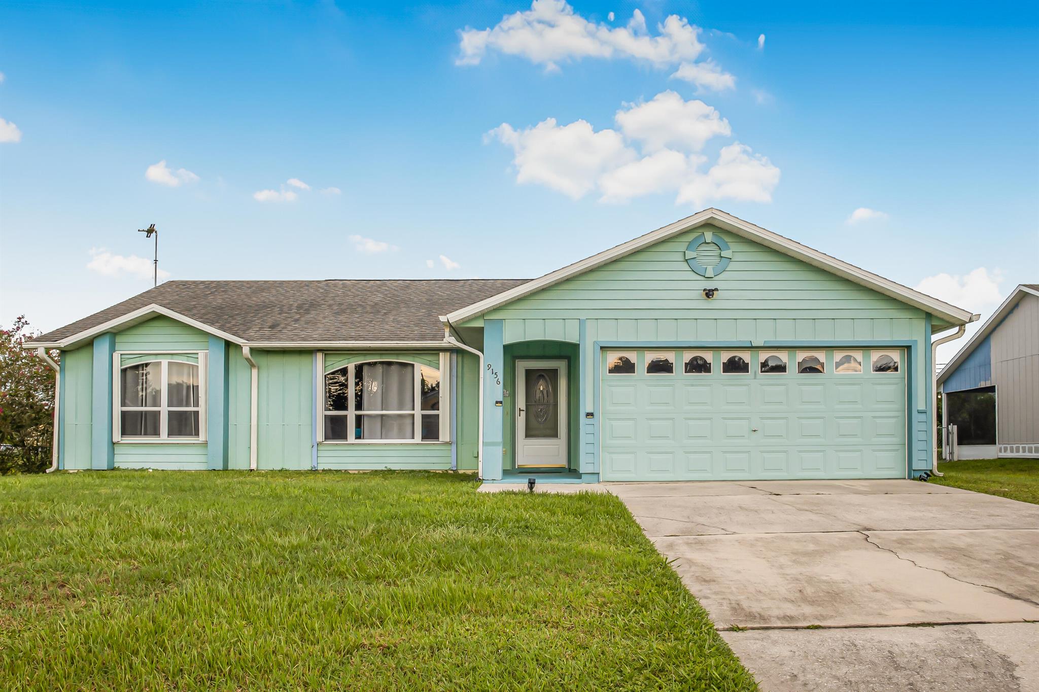 Welcome to this 3-bedroom, 2-bath home offering 1,206 sq. ft. of comfortable living space. Nestled on a paved road with a spacious yard, this home combines modern updates with a cozy small-town feel. Enjoy peace of mind with a brand-new A/C system and water softener, plus the convenience of being just minutes from I-95, beautiful beaches, and plenty of shopping and dining options. Whether you're relaxing at home or heading out to enjoy Florida living, this home offers the perfect balance of comfort and convenience. Don't miss out--this cute and cozy home is ready for its next owner!