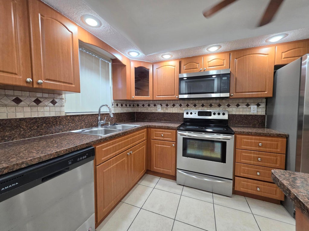 Photo of 5860 NW 44TH Street #502, Lauderhill, FL 33319 (MLS # B26078340)