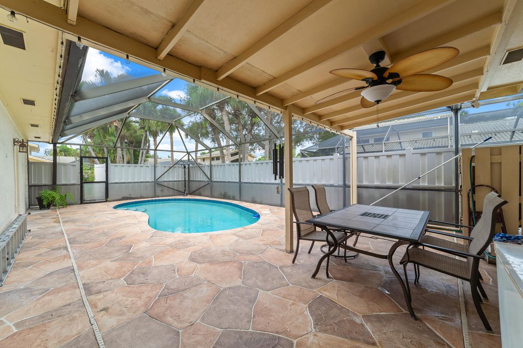 Photo of 12772 Woodmill Drive, Palm Beach Gardens, FL 33418 (MLS # R11016063)