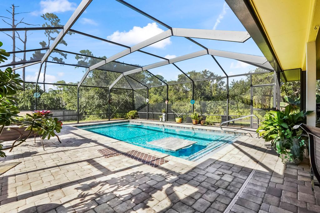 Photo of 5301 Bald Cypress Trail, Fort Pierce, FL 34951 (MLS # R11148511)