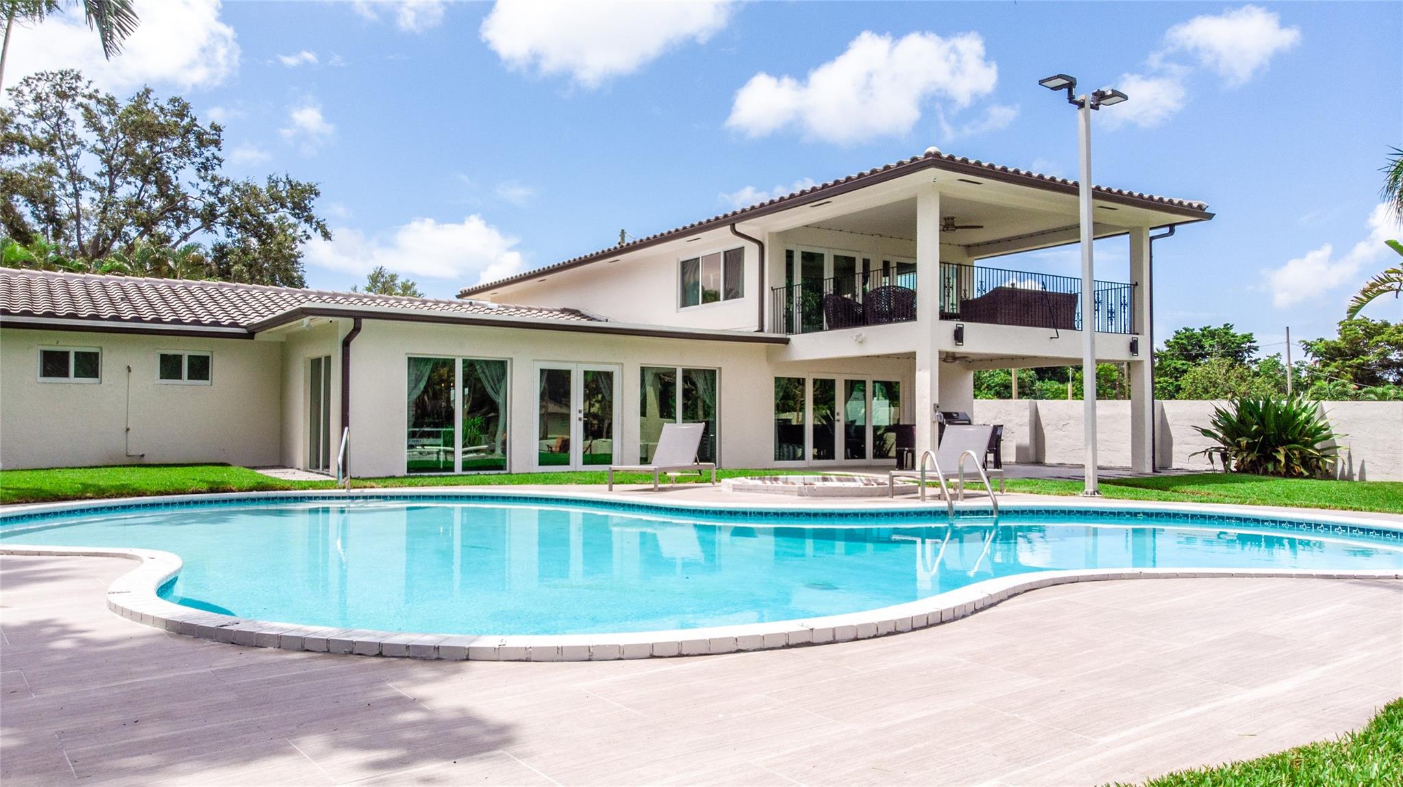 Experience the ultimate in waterfront luxury at this fully furnished 5BR/3BA canal-front residence in Fort Lauderdale. Boasting over 3,300 sq ft of elegant living space, this home features an open-concept design, a gourmet chef’s kitchen with premium appliances, spacious bedrooms, and high-end finishes throughout. Outdoor living shines with a 100-ft private dock (ocean access via fixed bridges), a sparkling 15' x 30' pool, and an expansive patio perfect for entertaining. Located minutes from pristine beaches, upscale dining, shopping, and major highways, this property offers the perfect blend of comfort, style, and convenience. Available for annual or seasonal lease; pets considered with restrictions.