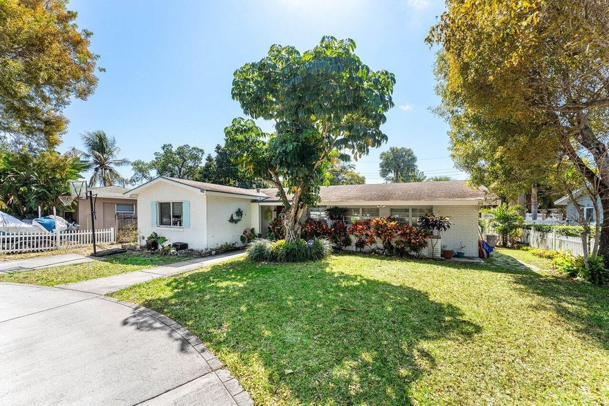 Live just minutes from the best of Delray Beach. Located in one of East Delray's rapidly evolving non-HOA neighborhoods, this 3-bedroom, 2-bath residence sits moments from Atlantic Avenue, Pineapple Grove, and the beach. Walk or bike to downtown dining, shopping, and nightlife while enjoying the privacy of a residential street.

The home offers a functional layout with generous living space and a sizable backyard with room to design your own outdoor retreat. Mature trees and established greenery give the property a true South Florida feel.

Surrounded by new development, this location continues to see strong growth. Whether you're looking for a primary residence close to the action or a smart move in one of Delray's most desirable pockets, this address delivers.
