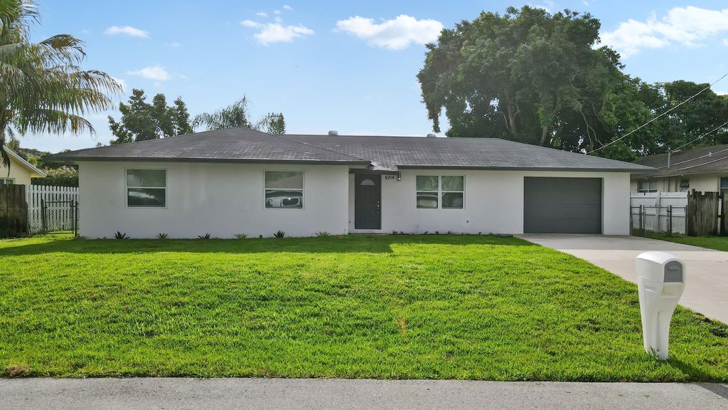 Photo of 6714 Riparian Road, Lake Worth, FL 33462 (MLS # R10909472)