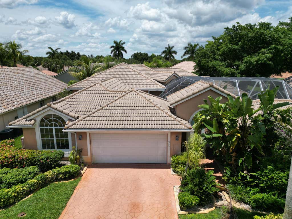 Photo of 10769 Maple Chase Drive, Boca Raton, FL 33498 (MLS # B26050514)
