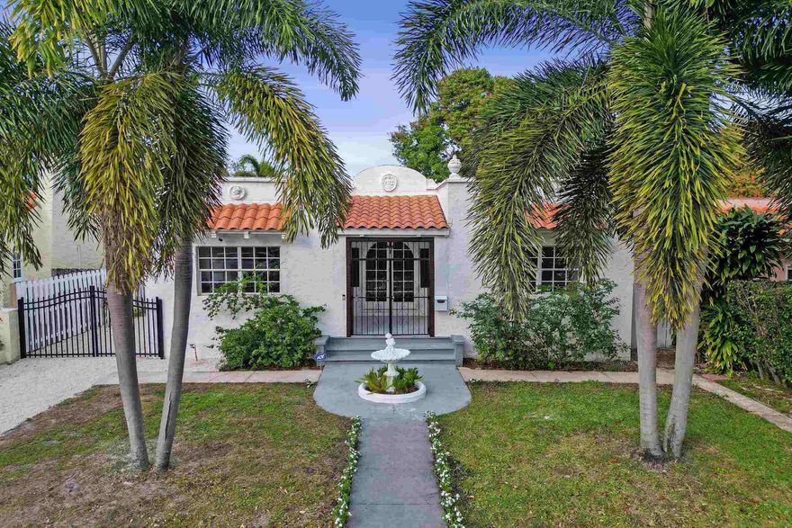 UNFURNISHED ANNUAL RENTAL.
Exquisite 1925 Mission Revival estate in the prestigious Old Northwood Historic District. This distinguished residence blends historic charm with modern luxury, minutes from downtown, the Intracoastal, and Palm Beach. The main house offers 2 bedrooms, 2 bathrooms, 9-foot ceilings, original wood floors, and elegant arched openings. Upgrades include Monogram appliances with gas range, Miele laundry, and spa-inspired bathrooms. A dedicated office/Zoom room provides a private workspace. The detached guest house has 1 bedroom, 1 bathroom, pecky cypress ceiling, full kitchen, and laundry. A heated pool and spa anchor a resort-style courtyard, ideal for sophisticated entertaining and indoor-outdoor Palm Beach living.