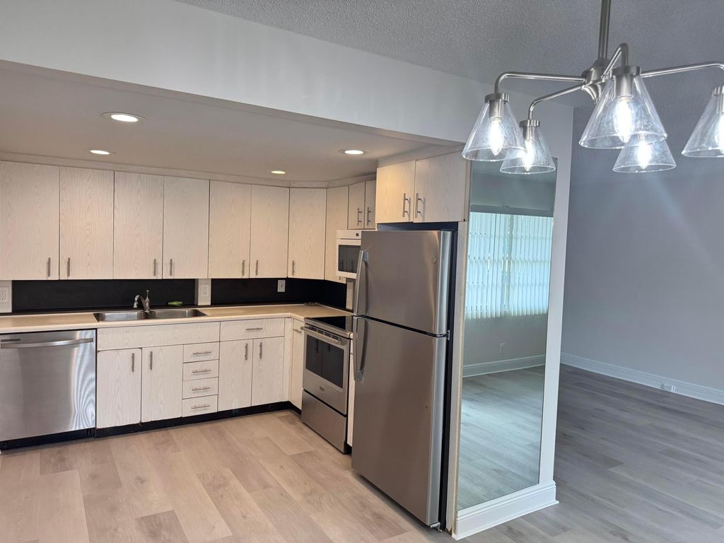 Photo of 2039 Rexford #C, Boca Raton, FL 33434 (MLS # R11168216)