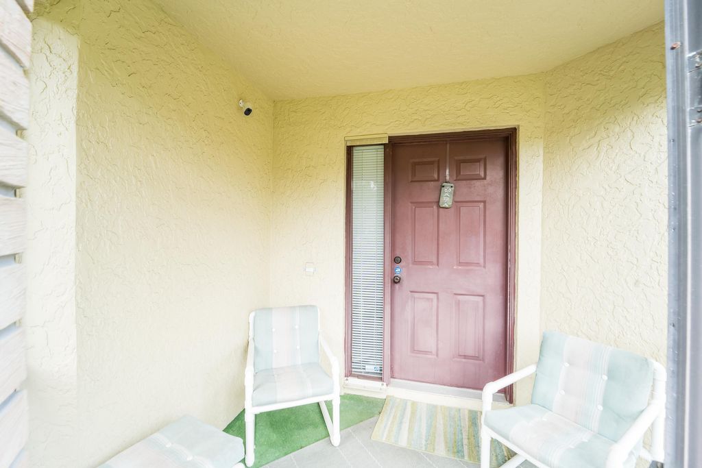 Photo of 108 Village Walk Dr, Royal Palm Beach, FL 33411 (MLS # B26000003)