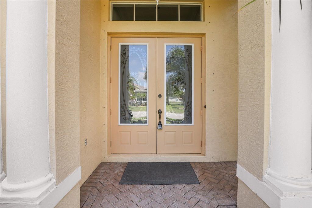 Photo of 521 SW Lake Manatee Way, Port Saint Lucie, FL 34986 (MLS # B26023705)