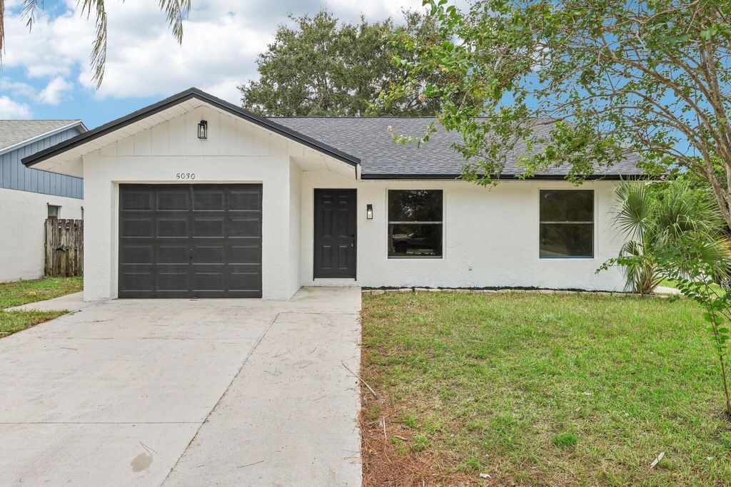 Photo of 5030 SE Dell Street, Stuart, FL 34997 (MLS # R11010330)