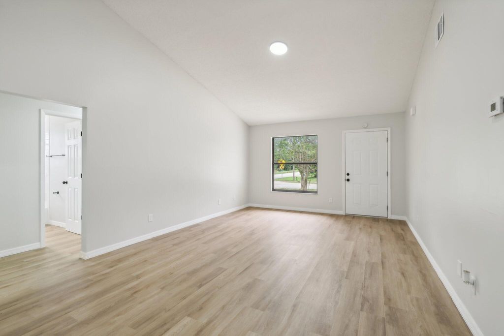 Photo of 5030 SE Dell Street, Stuart, FL 34997 (MLS # R11010330)