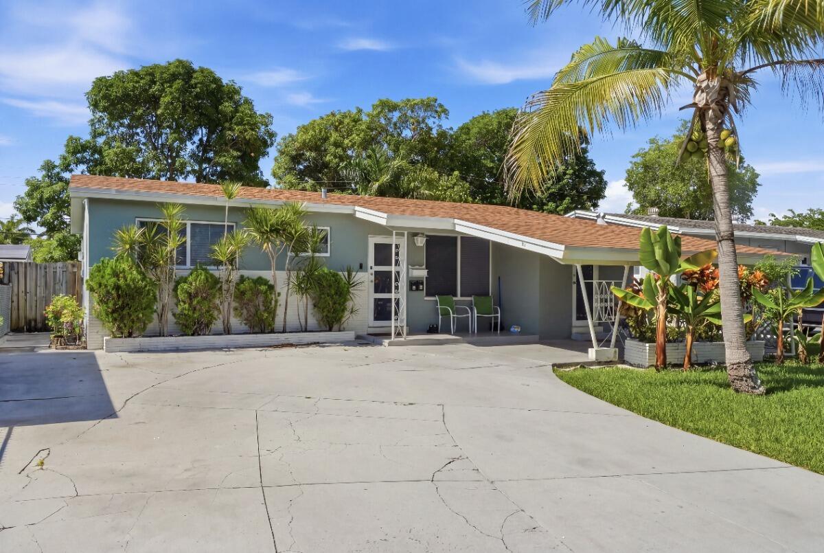 309 SW 7TH Court