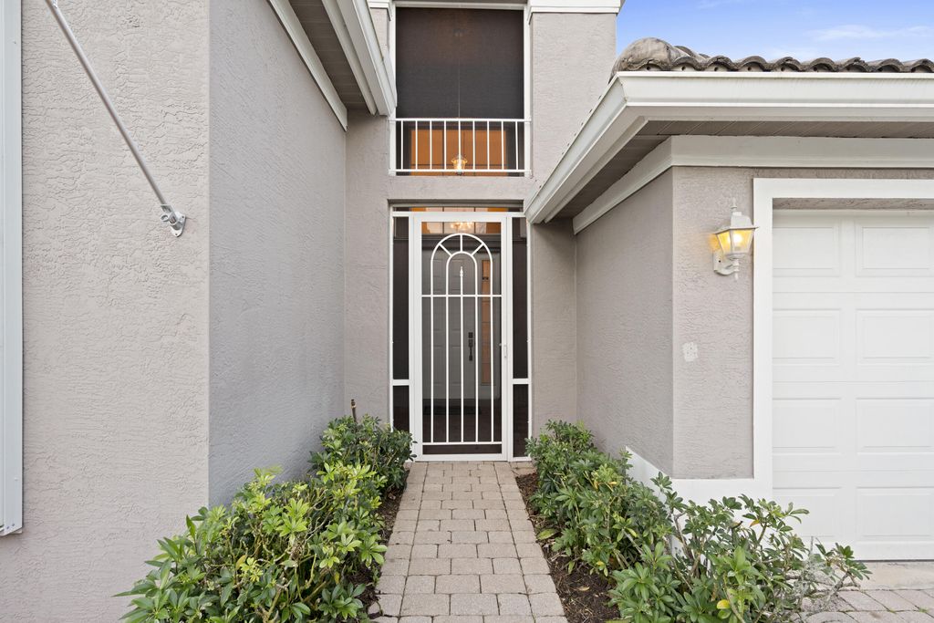 Photo of 324 NW Somerset Circle, Port Saint Lucie, FL 34983 (MLS # B26006886)