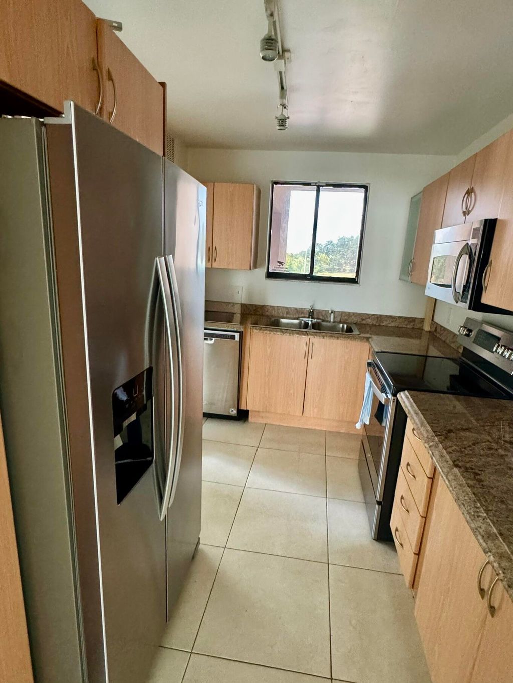 Photo of 5981 VÃ­a Vermilya #208, Lantana, FL 33462 (MLS # B26034449)